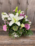Lilies, roses and a sweet succulent
