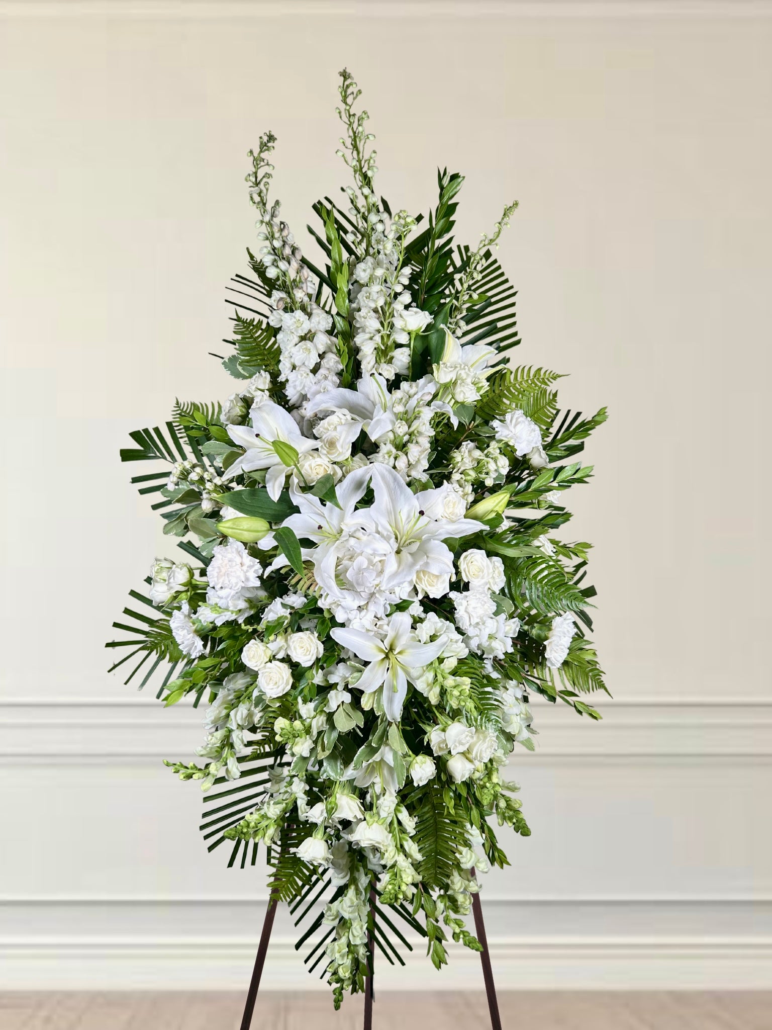Elegance in White Standing Spray on an Easel