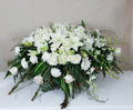 Elegant, formal White Casket Spray