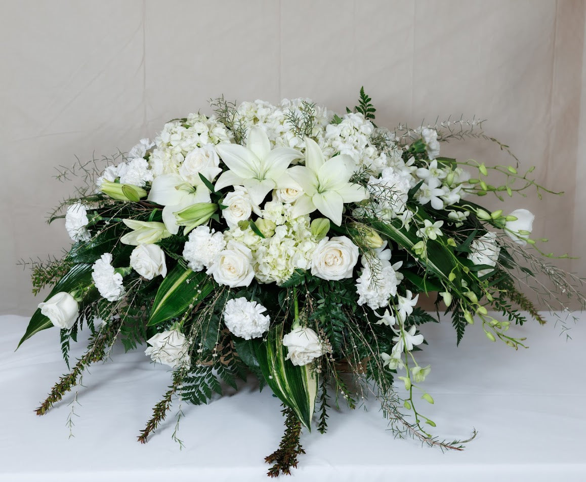 Elegant, formal White Casket Spray