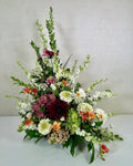 Seasonal Bloom Sympathy Arrangement