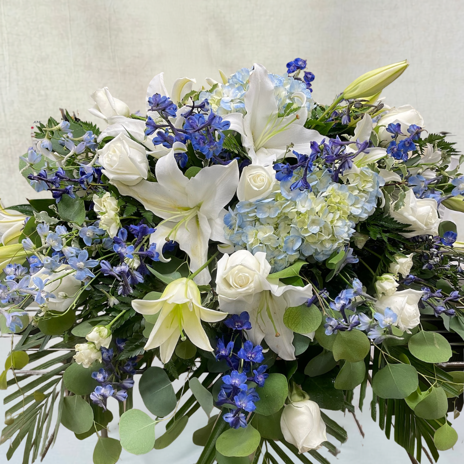 Blue Hydrangea and White Lily Casket Spray